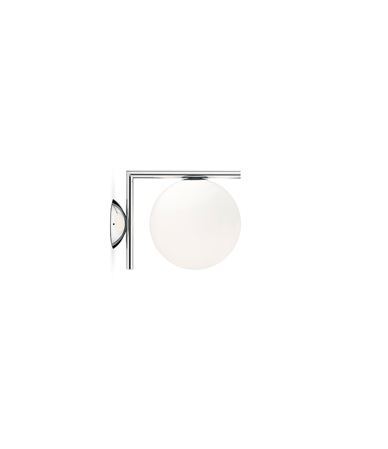 Small Flos IC Lights Ceiling/Wall sconce. Chrome L-shaped body connected to opaque white glass spherical diffuser.