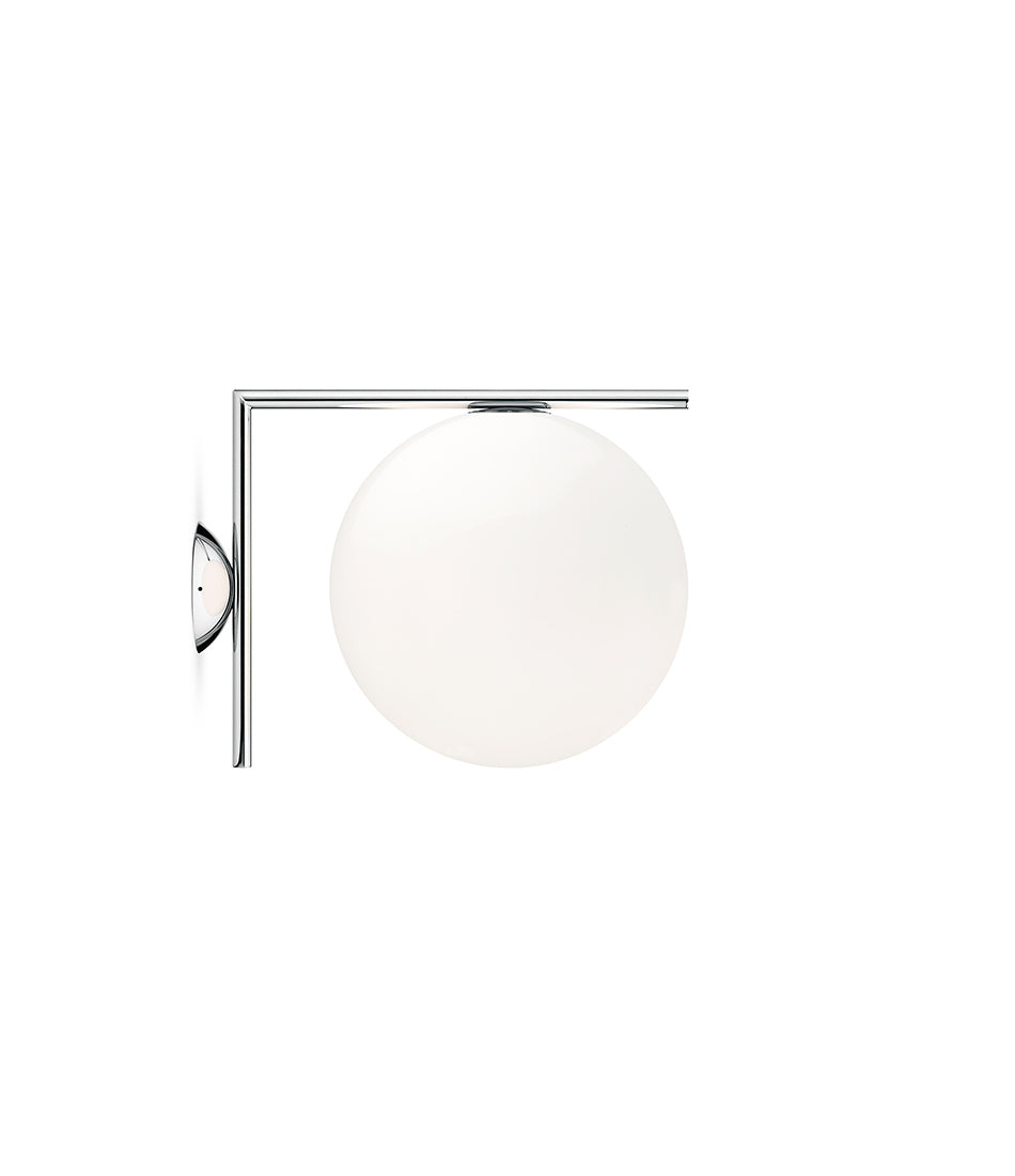 Flos IC Lights Ceiling/Wall sconce. Chrome L-shaped body connected to opaque white glass spherical diffuser.