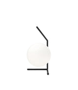 Flos IC Lights T1 Low table lamp, with spherical white diffuser attached to angular black bar and bipod base.
