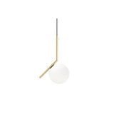 Small Flos IC Lights suspension lamp, with spherical white diffuser attached to angular brass bar.