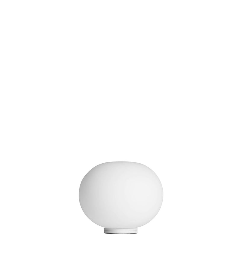 Flos Mini Glo-Ball table lamp. Globe-shaped opaque glass diffuser fixed to circular flat base.