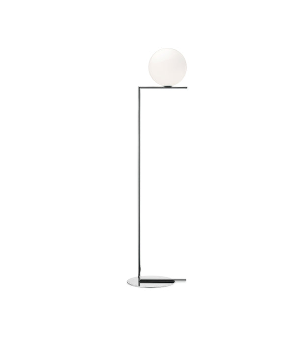 Flos IC Lights Floor Lamp, with opaque white glass spherical diffuser mounted atop an L-shaped chrome stem.