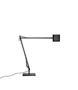 Black Flos Kelvin Edge table lamp, with double-jointed stem and flat multi-directional LED head.