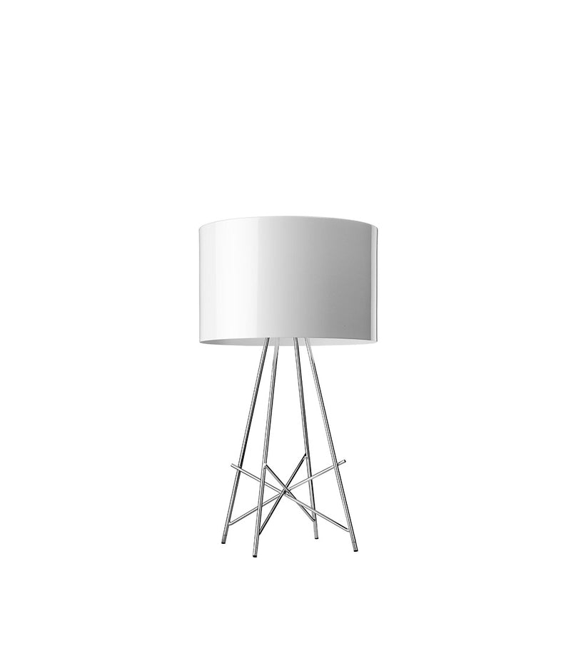 Flos Ray table lamp. Glossy white shade atop four chrome legs.