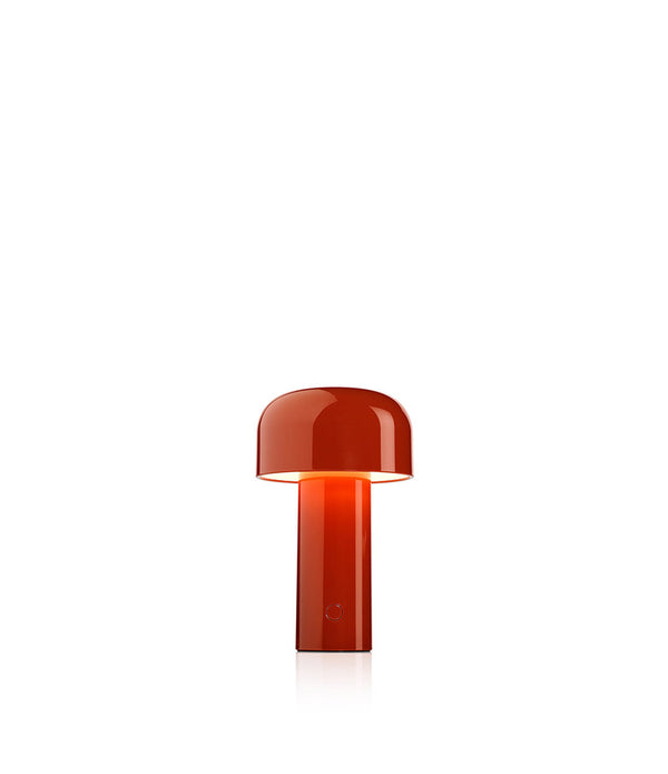 Portable table lamp in burnt orange.