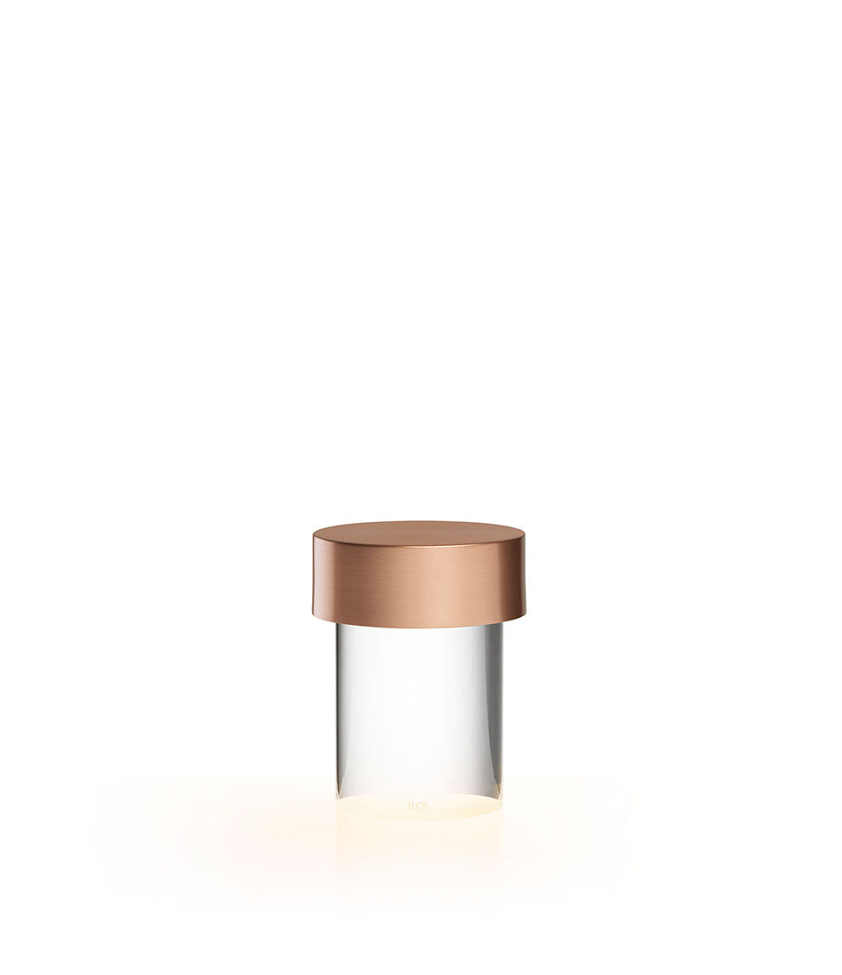 Flos Last Order table lamp in satin copper and clear diffuser.