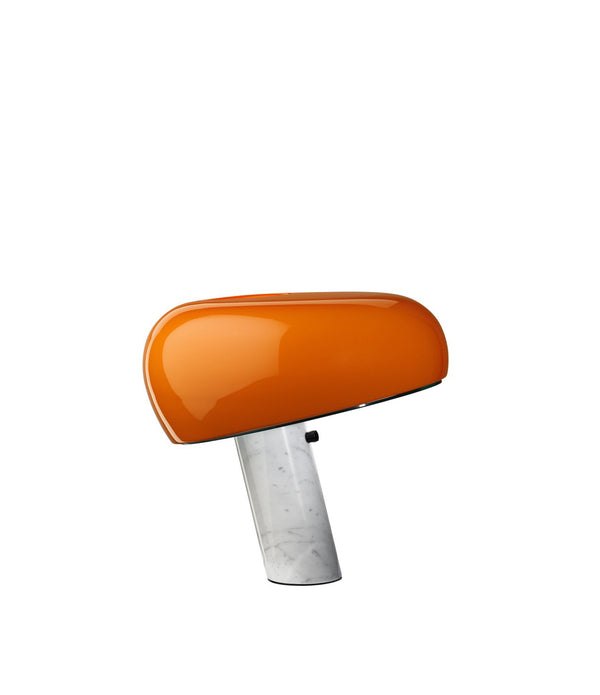 Flos Snoopy table lamp. Hood-shaped orange shade atop an angled marble base stem.