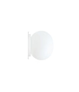 Flos Mini Glo-Ball wall/ceiling lamp. Opaque globe-shaped opaque white diffuser fixed to flat circular base.