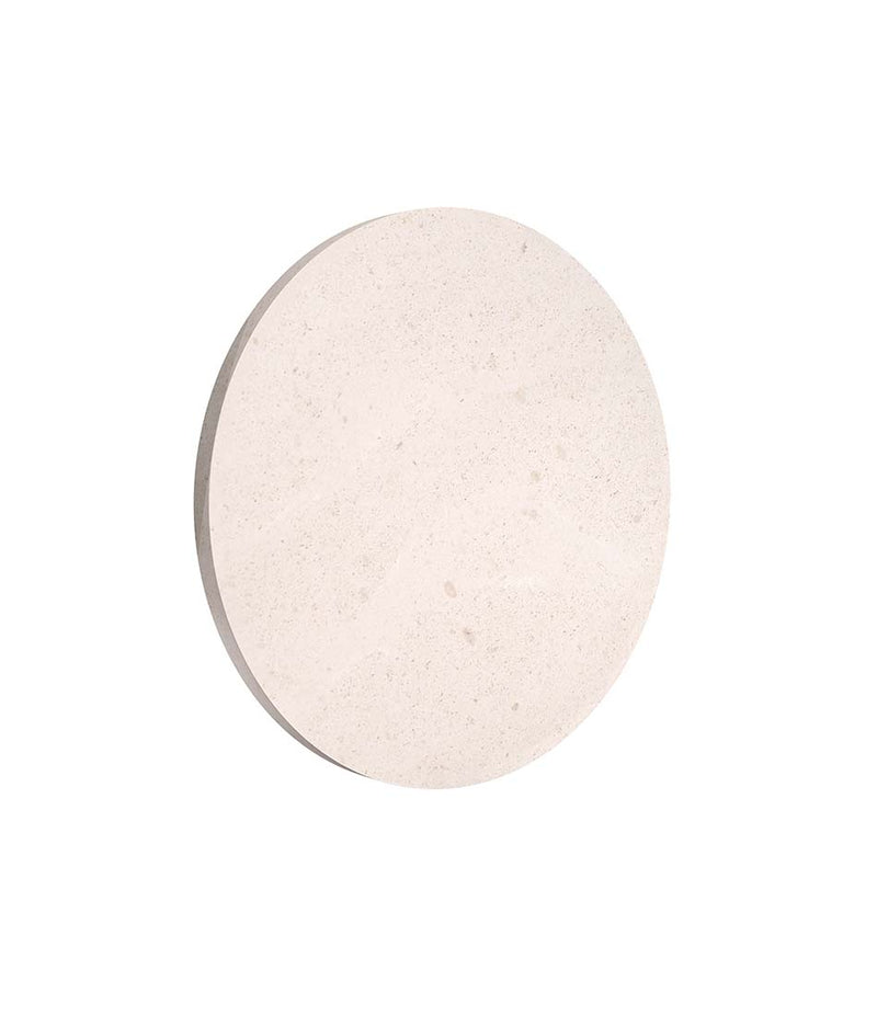 Flos Wall Camouflage wall sconce in Creme d Orcia stone finish. Ultra-slim disc shape.