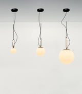 Artemide NH14, NH22 and NH35 suspension lamps hanging from a ceiling.