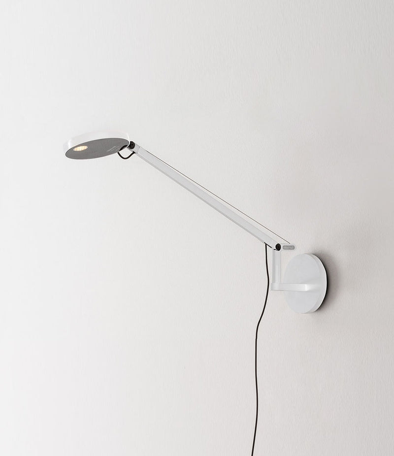 Demetra Micro Wall lamp in white mounted to a wall.