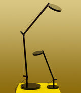 Artemide Demetra Professional LED table lamp on a platform next to Demetra Micro table lamp.