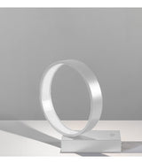 White Artemide Eclittica table lamp, with a vertical ring light set atop a rectangular base.