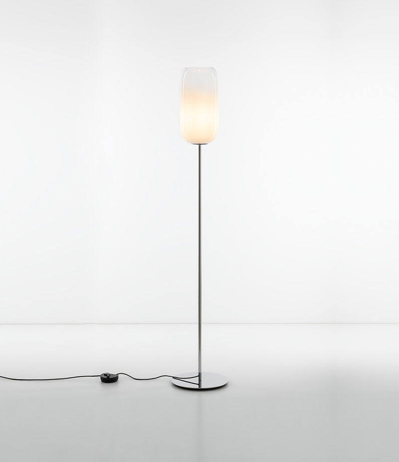 Artemide Gople floor lamp, with chrome stem and base, with gradient blown glass shade in white finish.