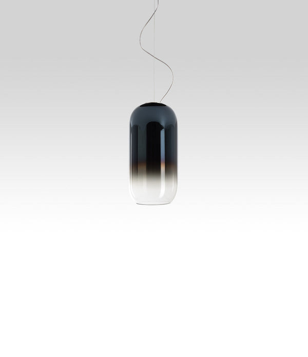 Artemide Gople Mini suspension light, with pill-shaped blow glass shade in gradient blue.
