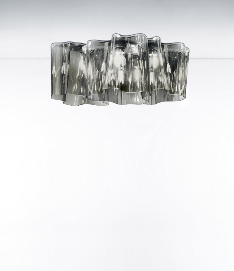 Artemide Logico ceiling lamp in smoke grey finish. Blown glass diffuser shaped into folded pattern.