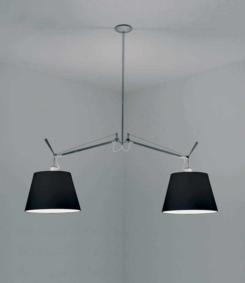 Artemide Tolomeo double suspension lamp with black lampshades mounted to ceiling.