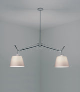 Artemide Tolomeo double suspension lamp with parchment lampshades connected to a ceiling.