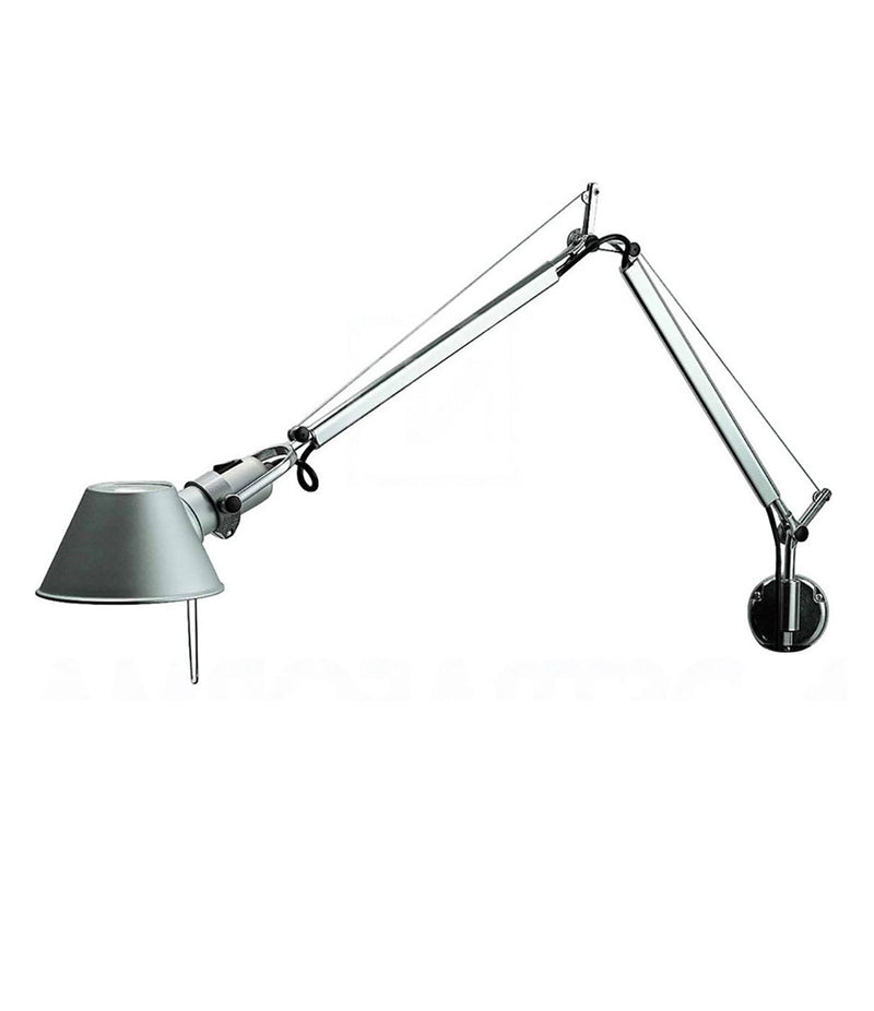 Artemide Tolomeo wall lamp mounted to a J-bracket, with double-jointed arm and small conical lamp head.