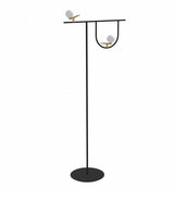 Artemide Yanzi floor lamp, with two light orbs perched on top of small brass sculptures connected to P-shaped stem.