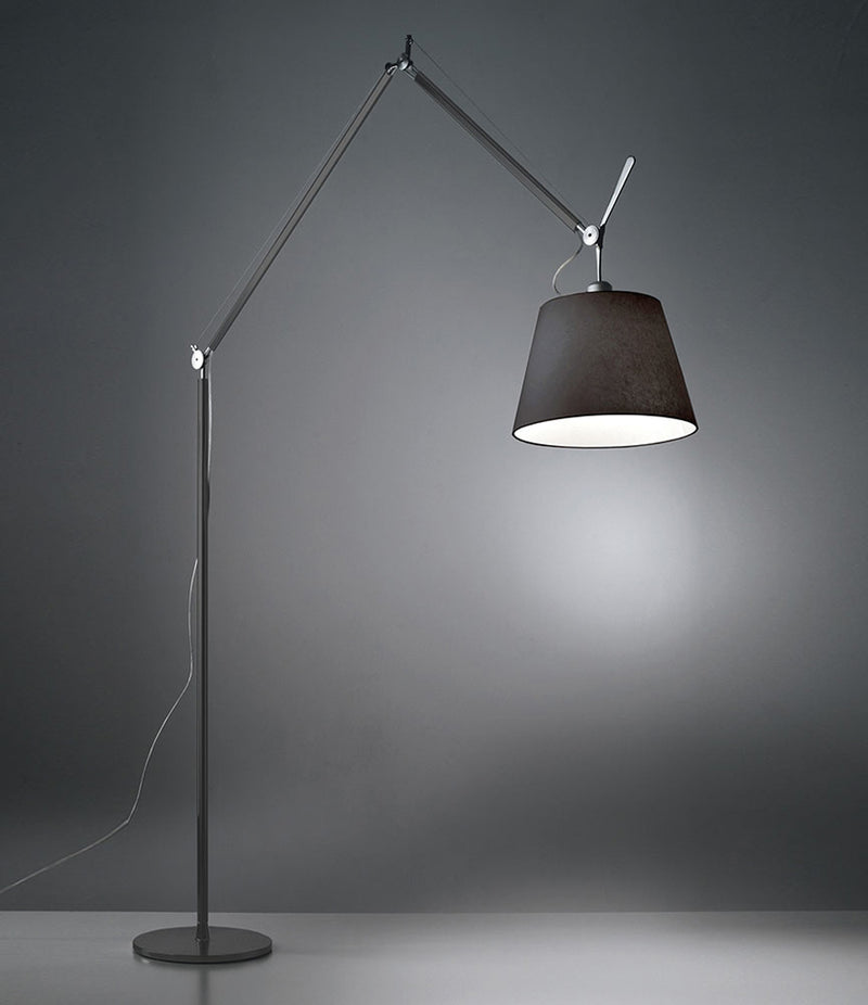 Black Artemide Tolomeo Mega floor lamp, with double-jointed arm.