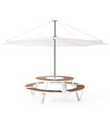 White Extremis Pantagruel picnic table, with light Iroko Hardwood slats on circular bench and circular tabletop. Large umbrella mounted at centre.