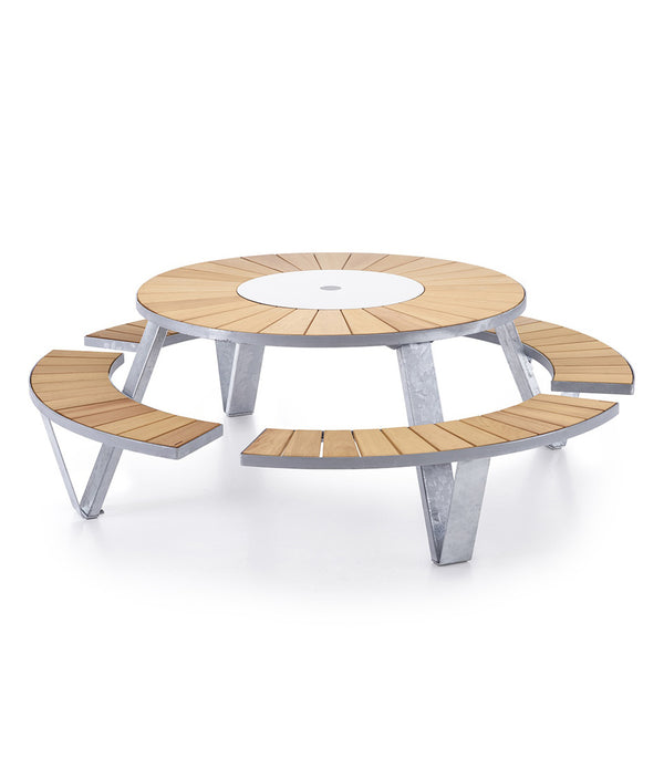 Galvanized steel Extremis Pantagruel picnic table, with light Iroko Hardwood slats on circular bench and circular tabletop.