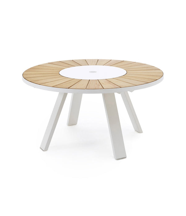 Extremis Pantagruel table with light Iroko Hardwood slat tabletop and white lazy Susan. Four independent legs make up the base.