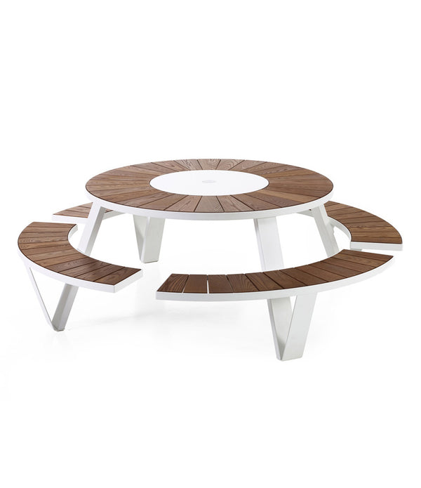 White Extremis Pantagruel picnic table, with dark hellwood slats on circular bench and circular tabletop.