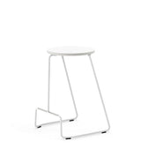 Extremis Tiki stackable counter stool, with white circular seat atop white wire frame.