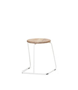 Extremis Tiki Stackable low stool, with oak circular seat atop white wire frame.
