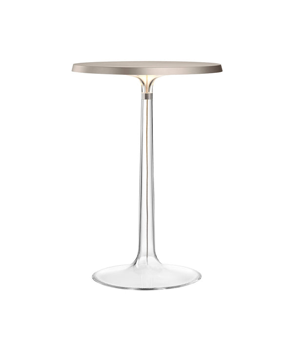 Flos Bon Jour table lamp, with transparent stem and flat disc light diffuser in matte silver.