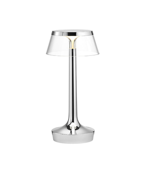 Flos Bon Jour Unplugged portable table lamp, with chrome stem and transparent crown.