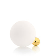 Flos Copycat table lamp. White opaque glass globe with small gold ball base.