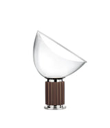 Flos Taccia table lamp. Glass bowl-shaped diffuser and anodized bronze base.