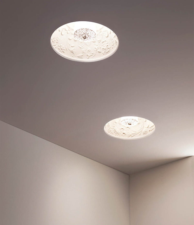 Two Flos Skygarden recessed lights set into a ceiling.